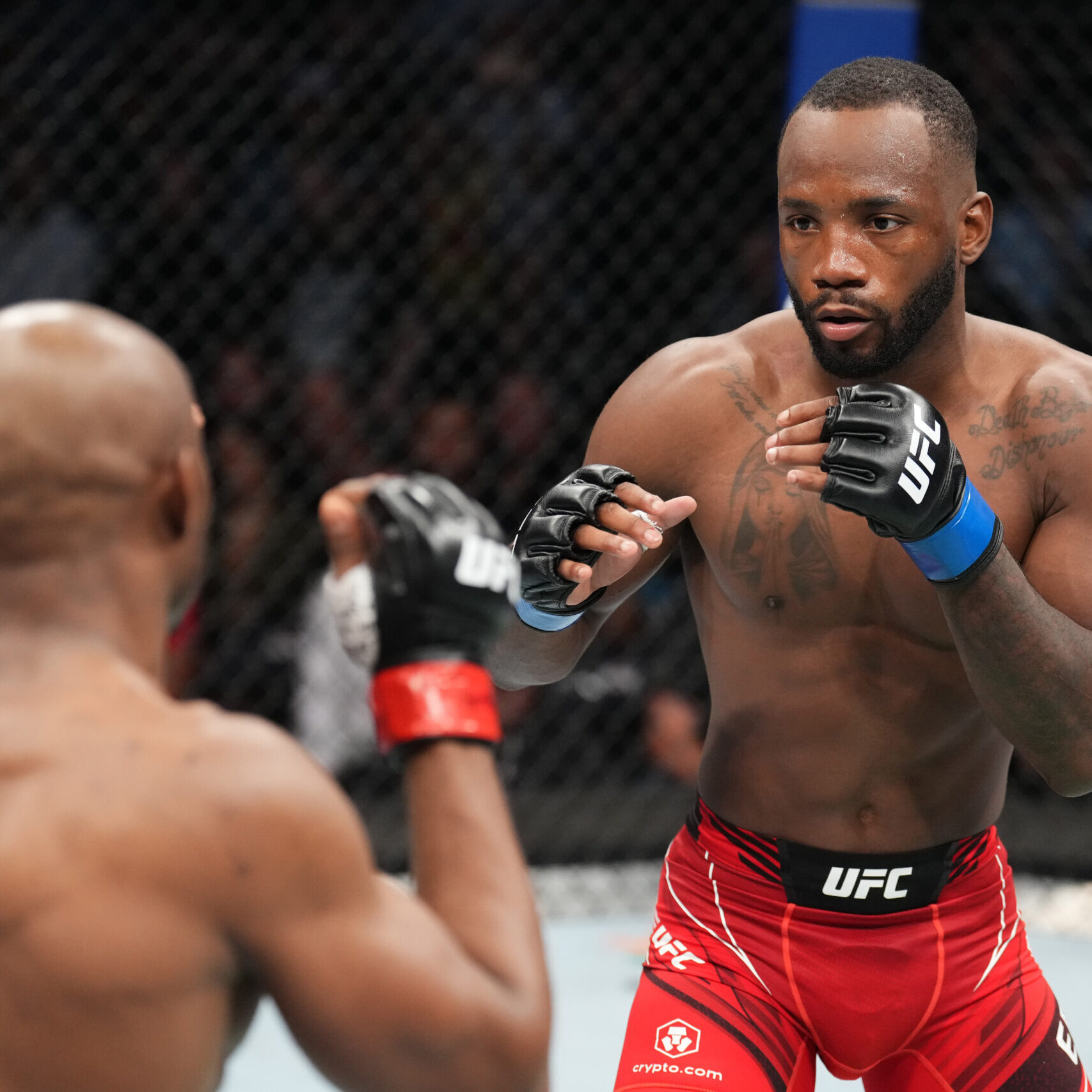 SALT LAKE CITY, UTAH - AUGUST 20: (R-L) Leon Edwards of Jamaica faces Kamaru Usman of Nigeria in the UFC welterweight championship fight during the UFC 278 event at Vivint Arena on August 20, 2022 in Salt Lake City, Utah. (Photo by Josh Hedges/Zuffa LLC)